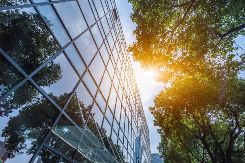 Modern office building with green leaves